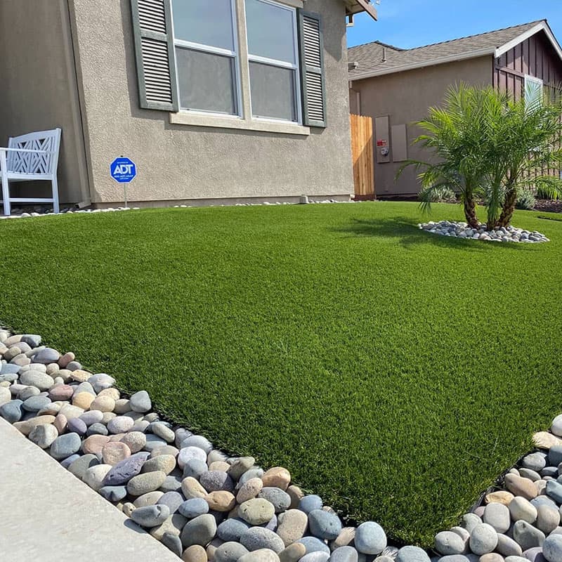artificial grass and rock landscaping