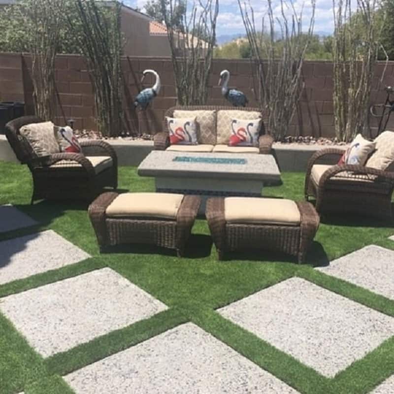 backyard with pavers and artificial grass