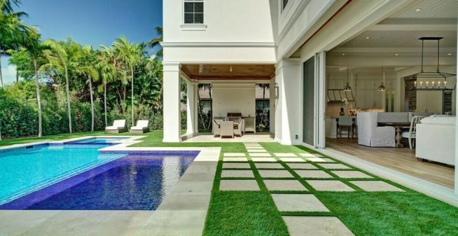 Artificial Grass, Swimming Pool, and Paver Strips for Your Exterior Balcony