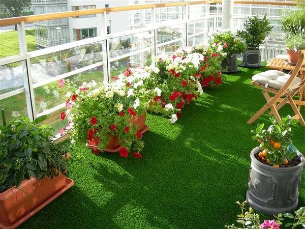 Balcony with Artificial Grass and Potted Plants