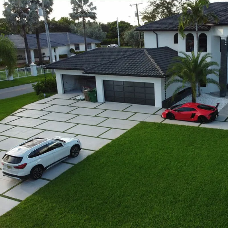 concrete driveway with artificial grass