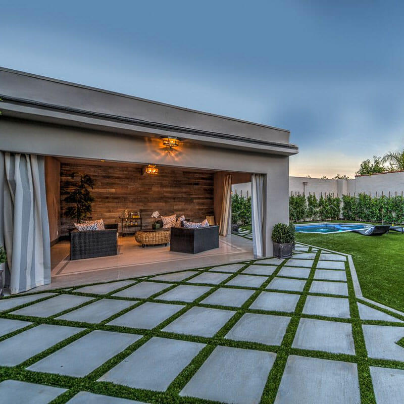 how to install artificial grass strips between pavers