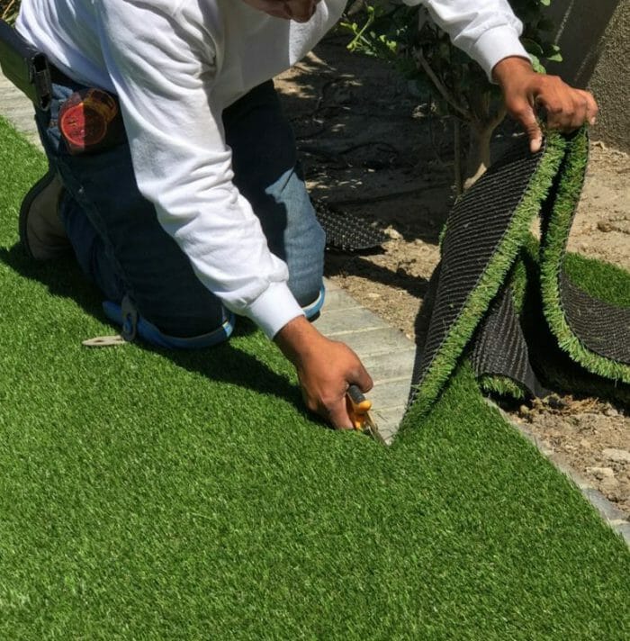 how to lay artificial grass on soil