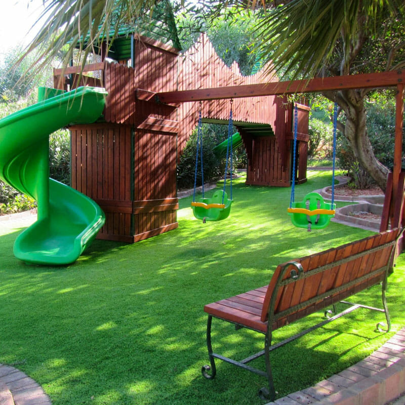 integrate a swing into your artificial turf landscape