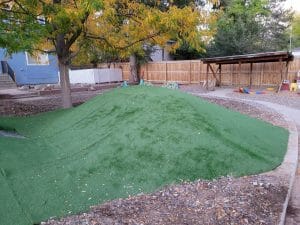 can you lay artificial grass on uneven ground