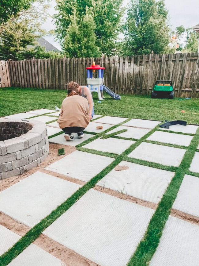 Adding a base layer for artificial grass between pavers