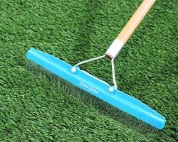 Brush rake for artificial grass