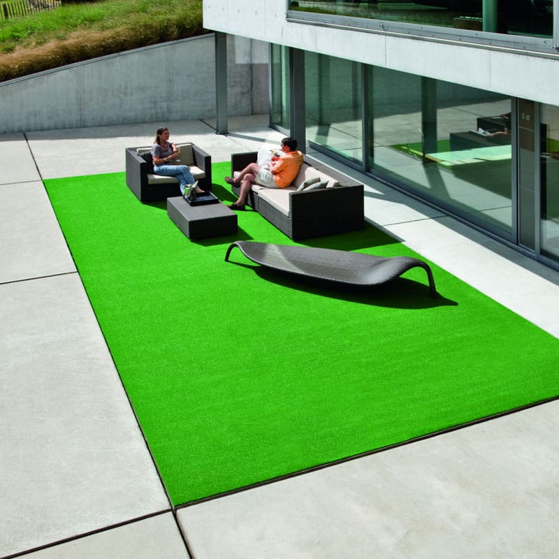 How to lay artificial grass on slabs