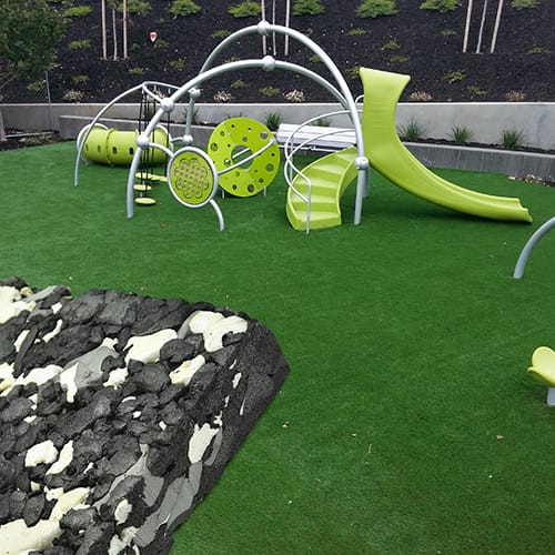 Padding for artificial turf on concrete