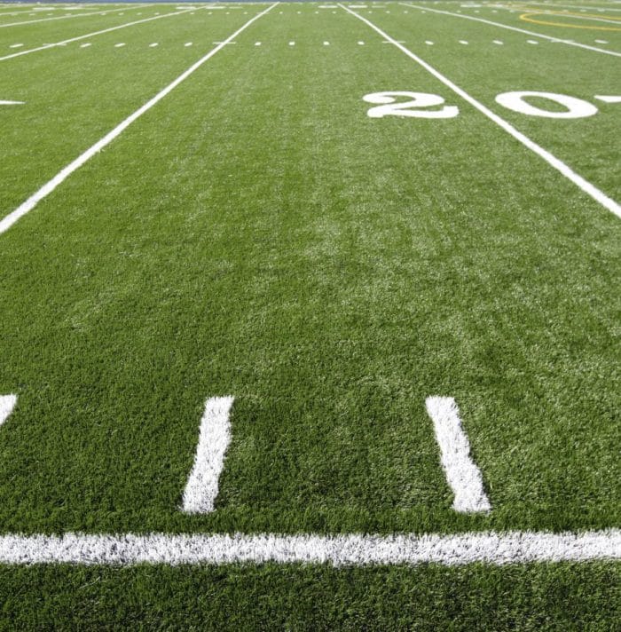 What is football field turf made of