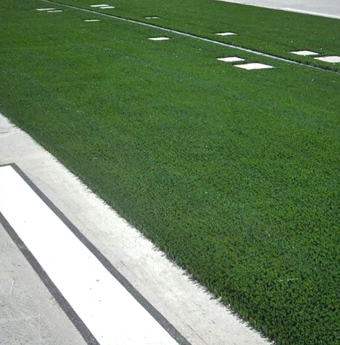 Artificial grass for airport runways and taxiways