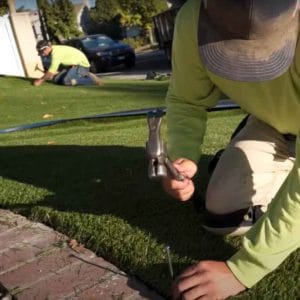 how to nail down artificial grass